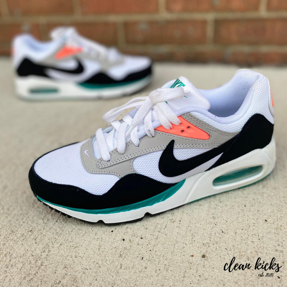white, black, green and orange women's nike air max correlate shoe cleaning